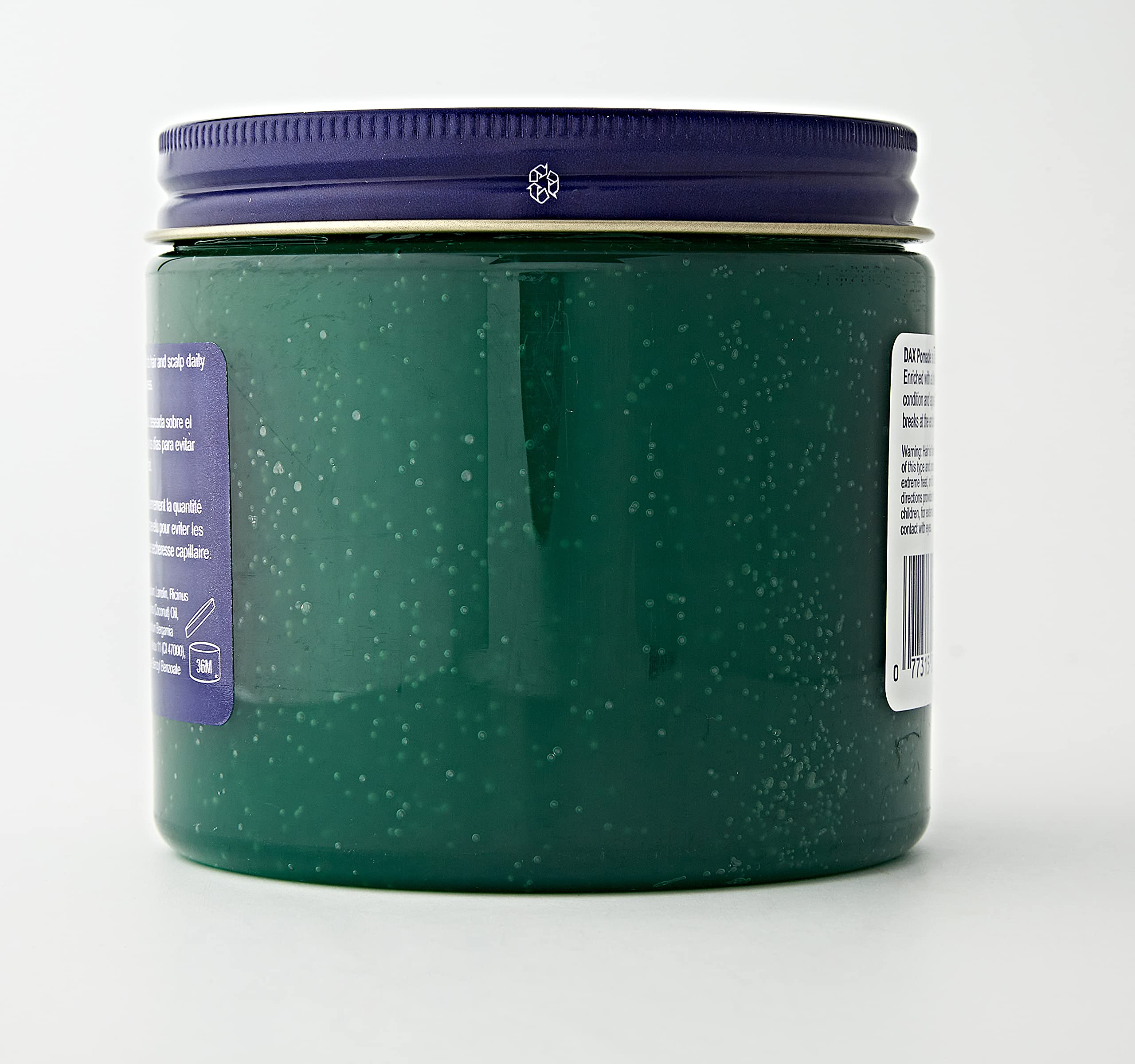 DAX Pomade in hand defines a textured curl