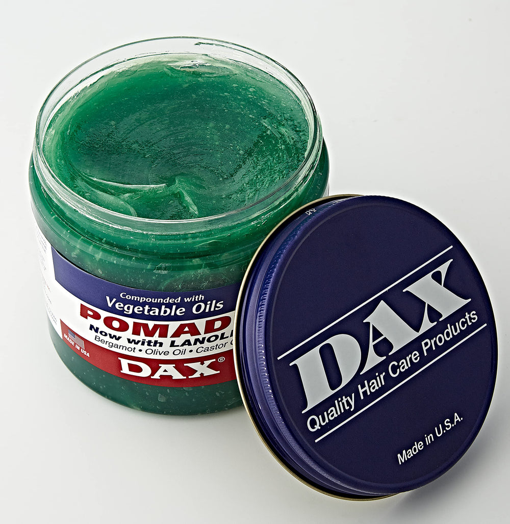 DAX Pomade label highlights suitability for dry and brittle hair