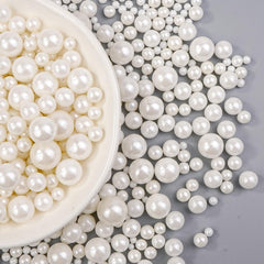 Dazzjoy edible white pearl sprinkles bottle for cake decoration, adding a subtle festive shine.