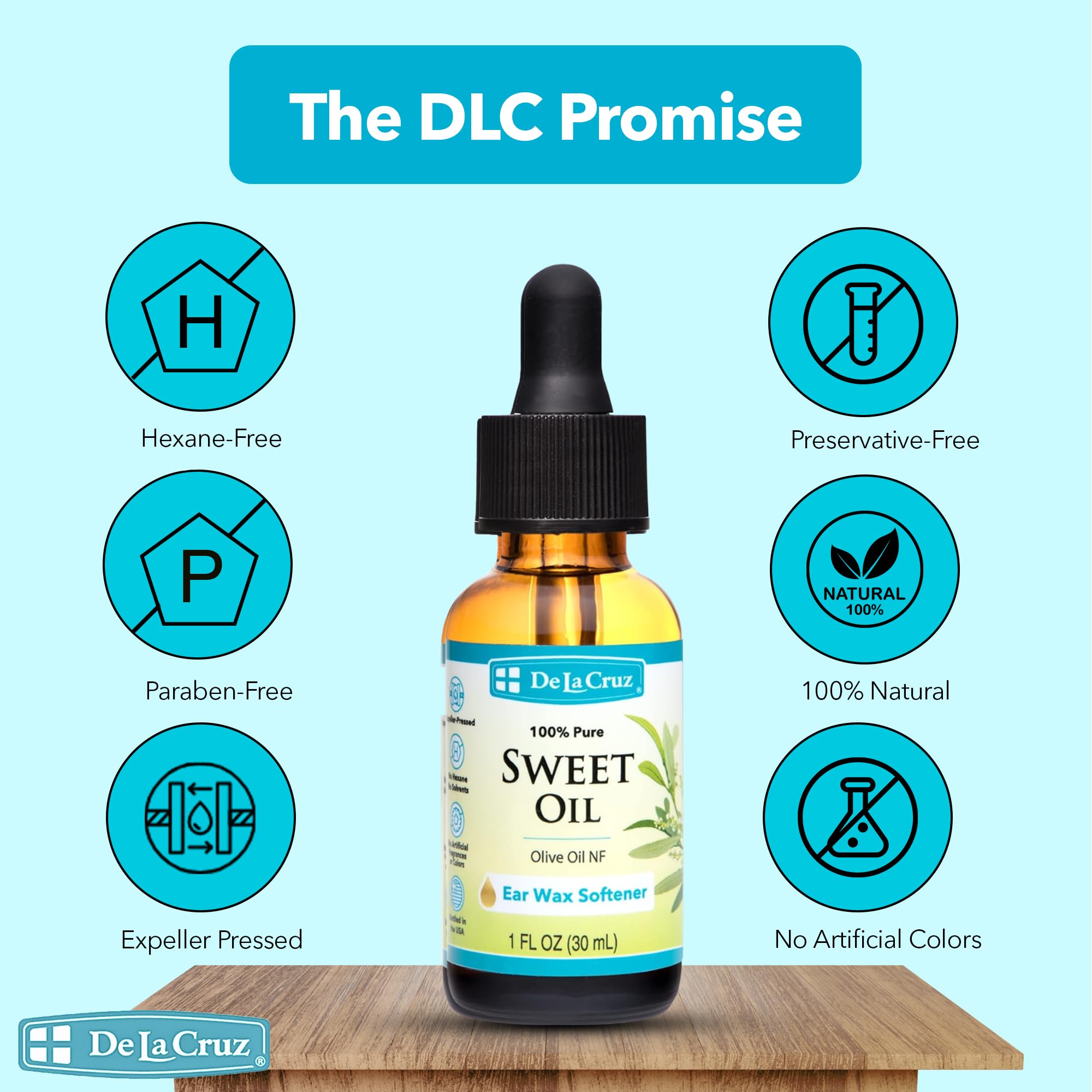De La Cruz ear oil amber bottle closeup showing pure expeller-pressed formula