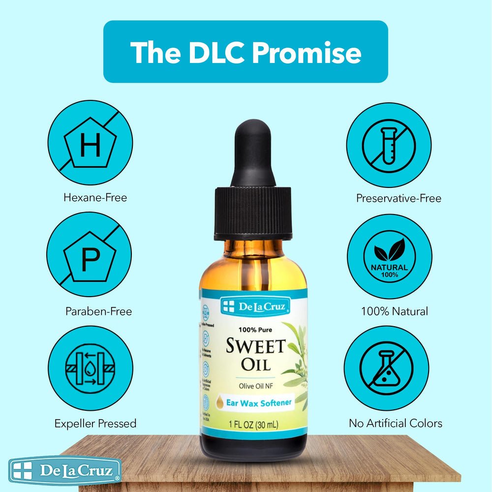 De La Cruz ear oil amber bottle closeup showing pure expeller-pressed formula