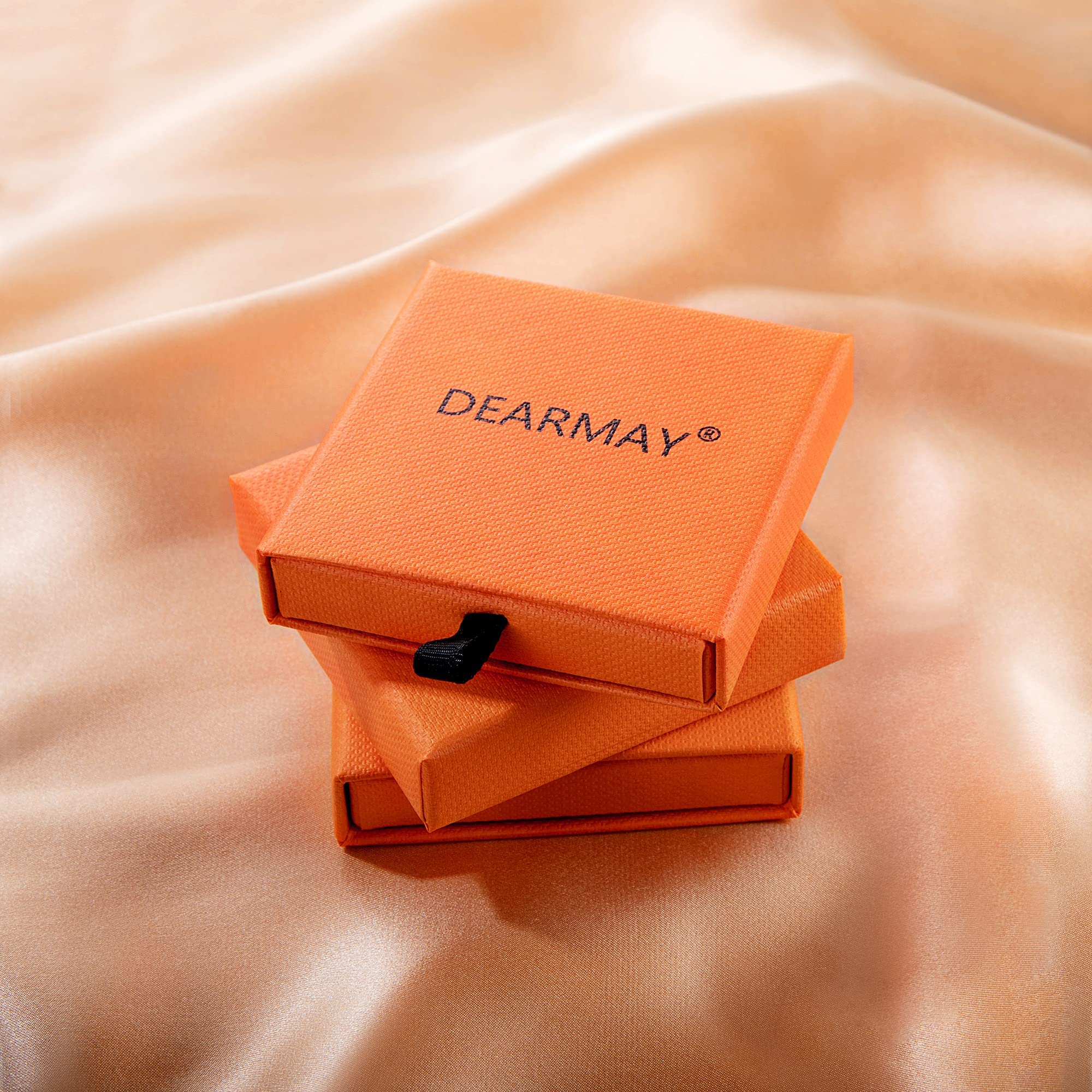 DEARMAY stackable bracelets collection worn together for versatile looks.