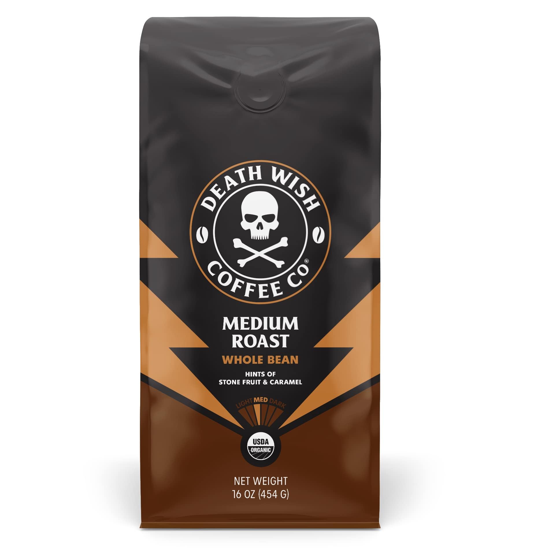 Death Wish Coffee whole bean bag on kitchen counter shows organic, fair trade quality for morning ritual.
