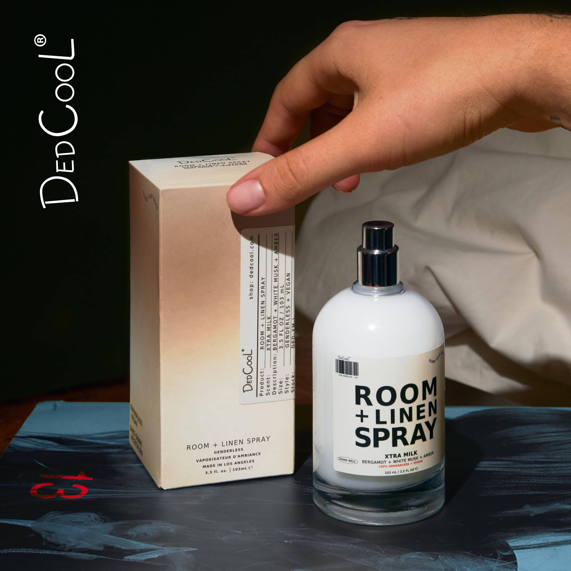 DedCool Xtra Milk travel-size bottle for on-the-go refresh.