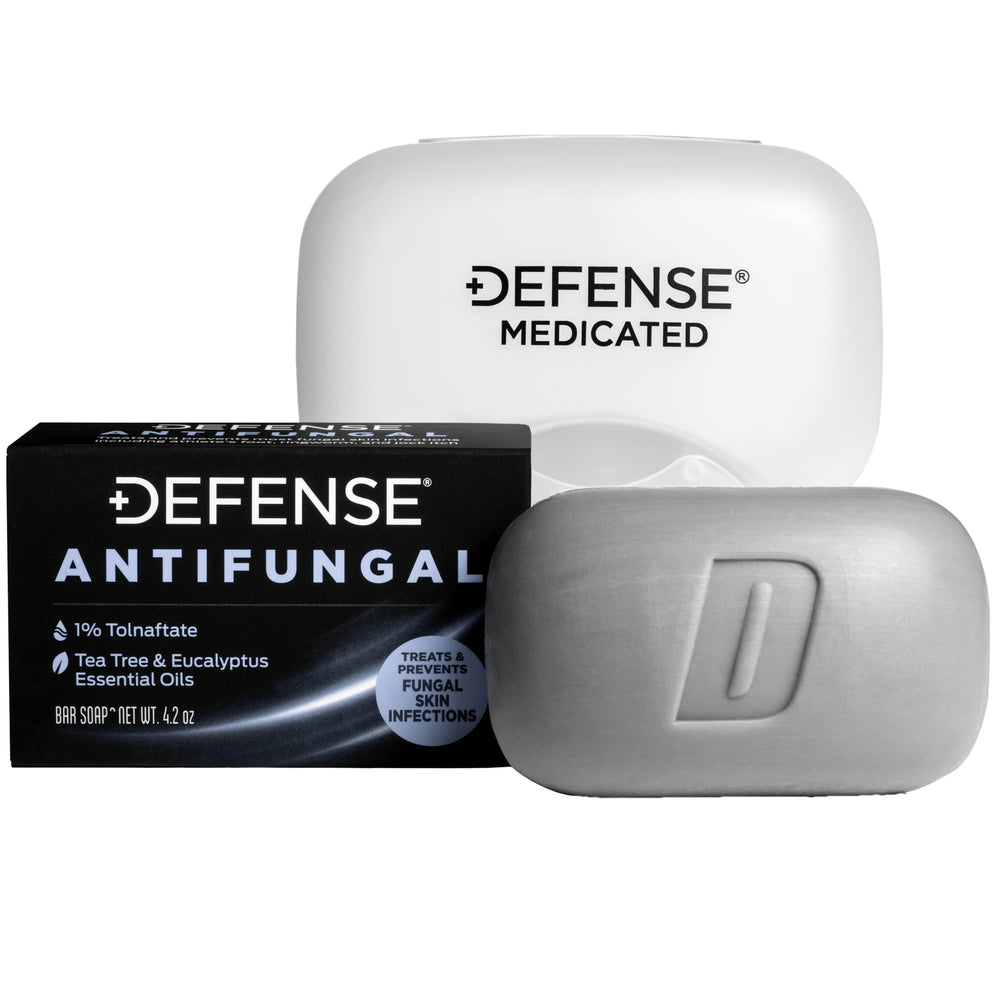 Defense Soap antifungal bar close-up with rich lather for gym use