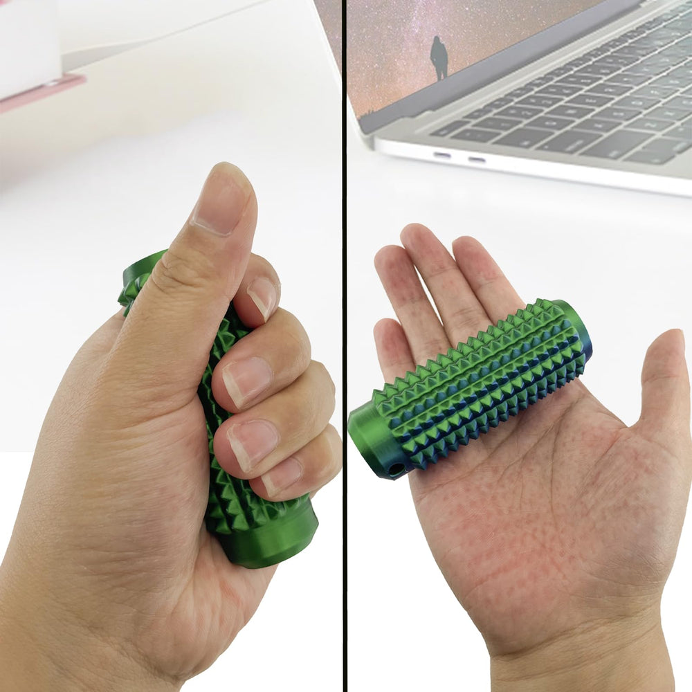 Deiviko Little Ouchies in hand demonstrating portable sensory tool.