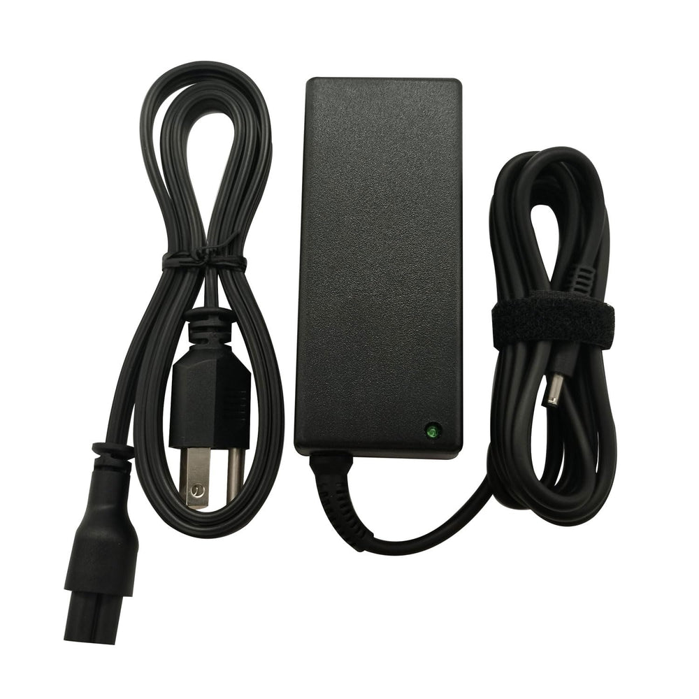 Dell 65W charger shown in compact travel case for easy packing.