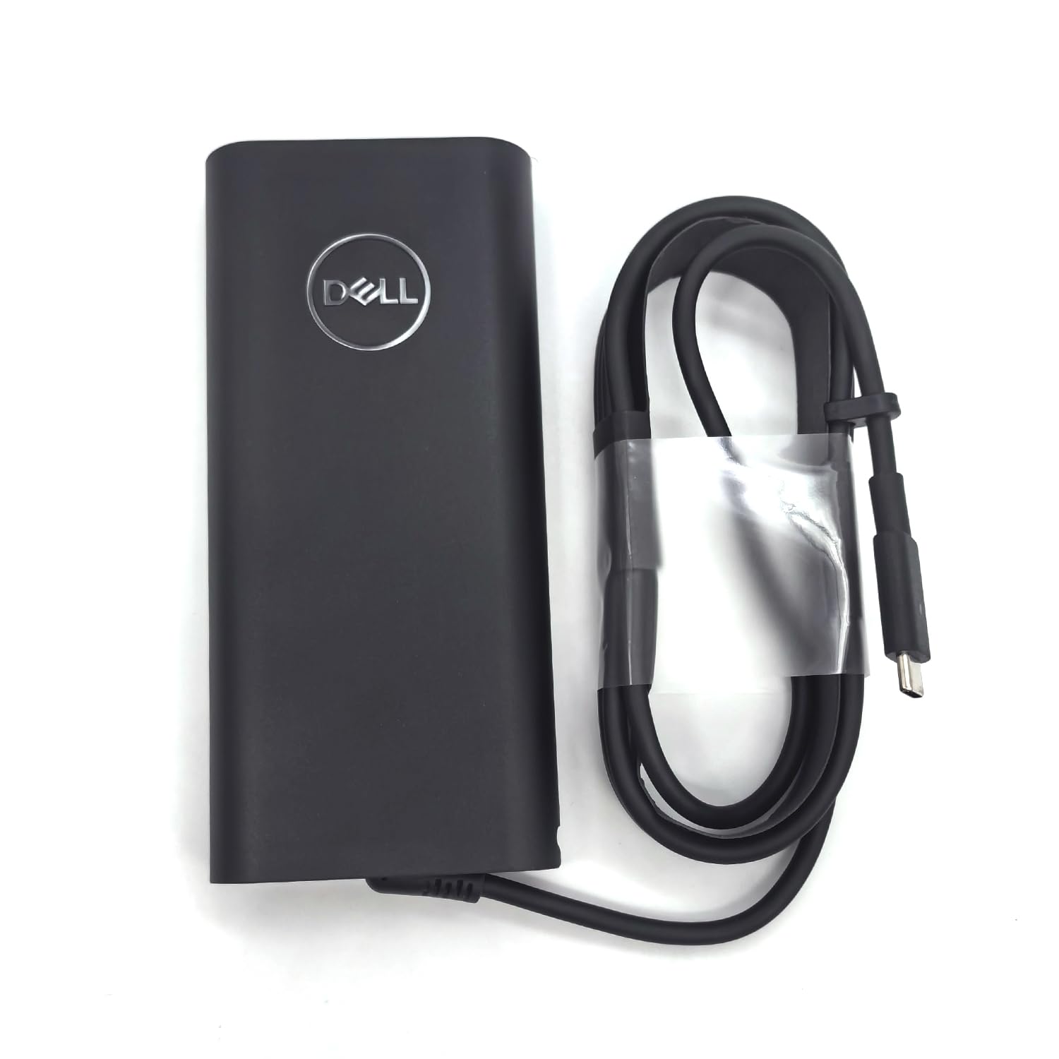 Non-retail packaging Dell AC adapter preserves authenticity for customers.