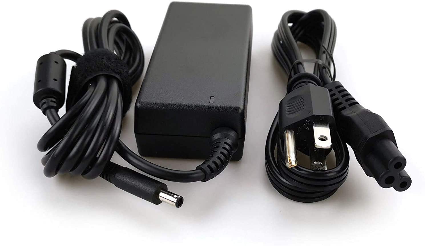Dell genuine charger branding signaling authentic accessory.