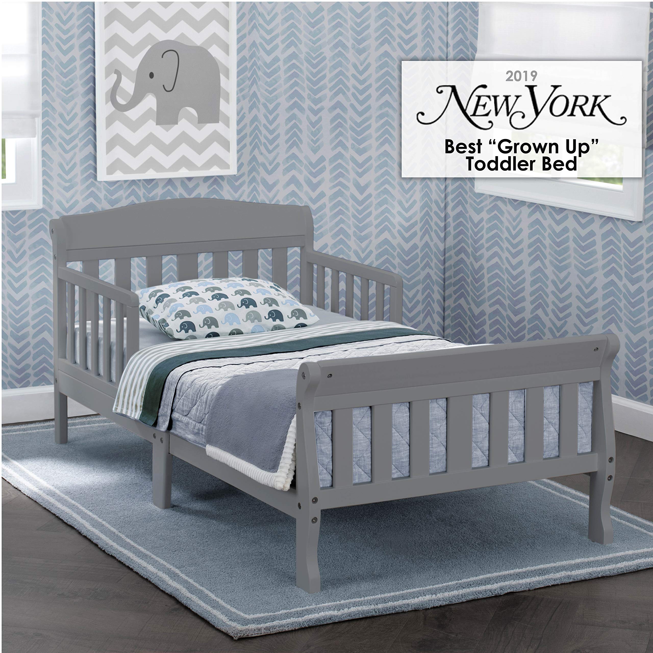 Delta Children Canton toddler bed grey side view highlights low profile for easy child access.