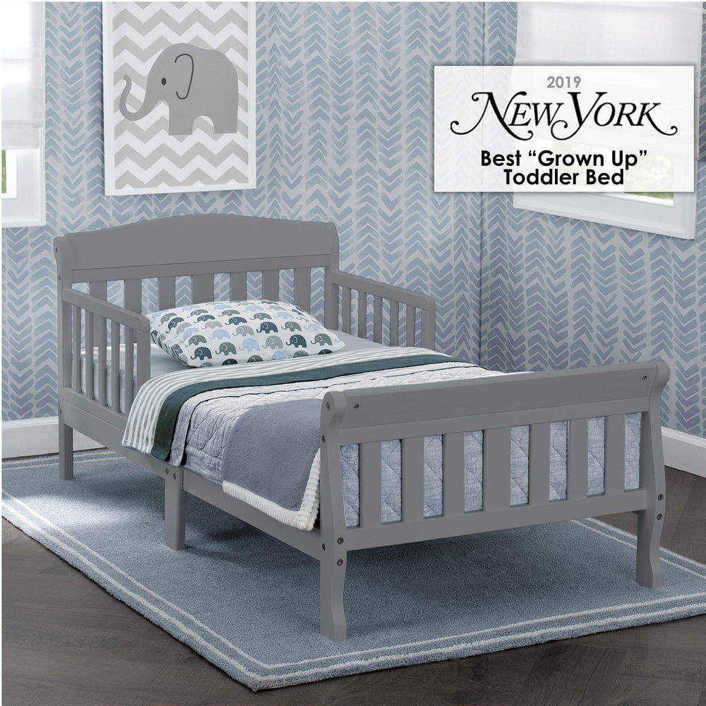 Delta Children Canton toddler bed grey side view highlights low profile for easy child access.