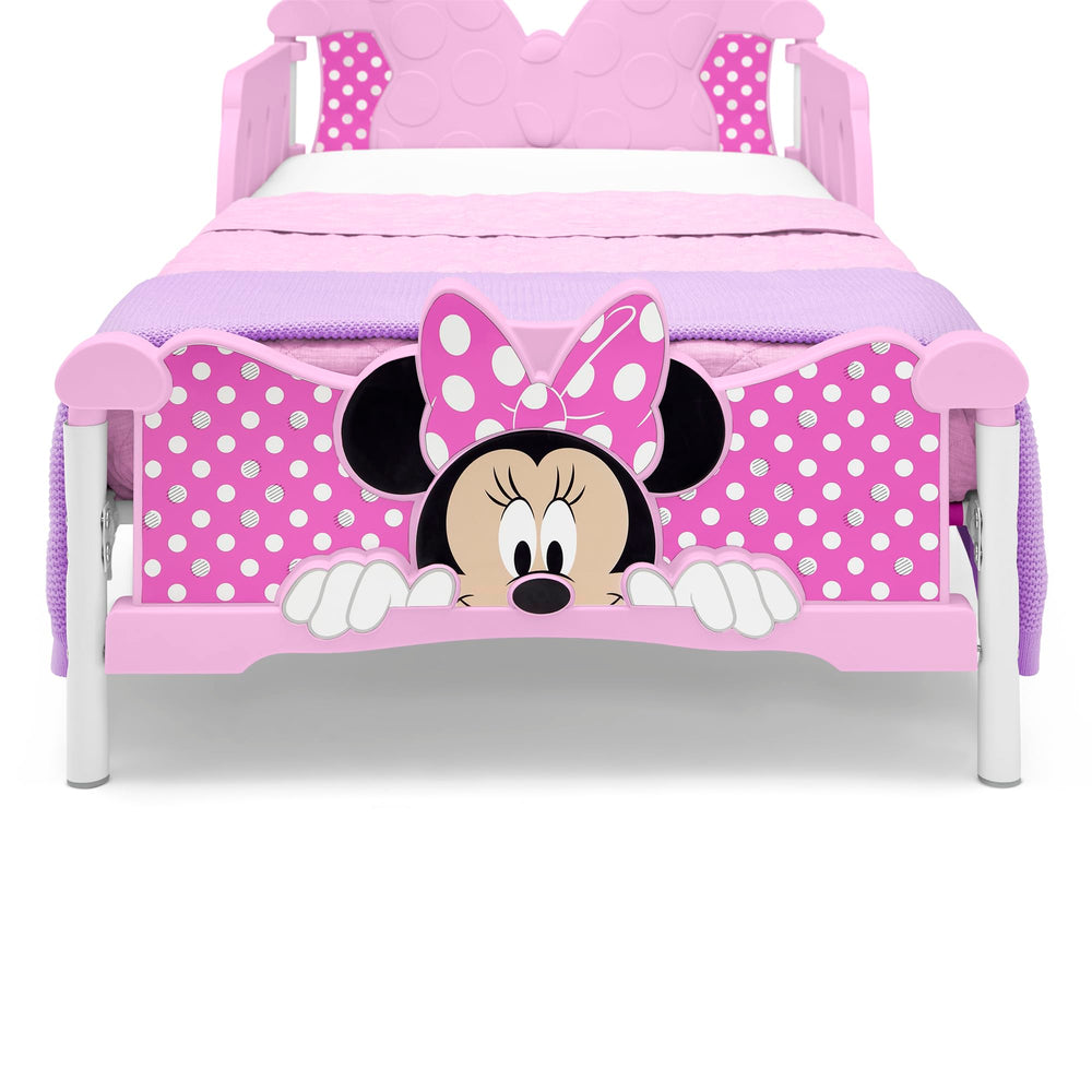 Delta Children Minnie Mouse 3D toddler bed pink dimensions show a compact kid-friendly size.