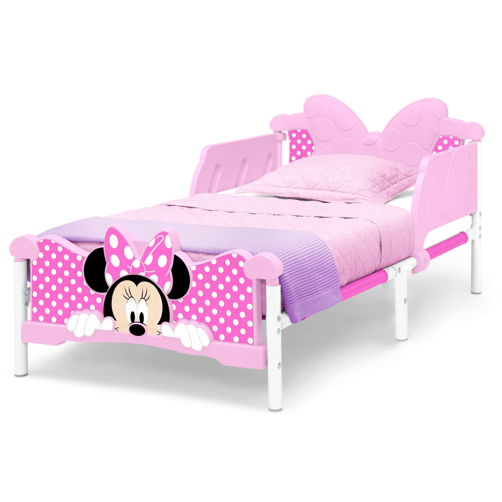 Delta Children Minnie Mouse 3D toddler bed pink guardrails provide sturdy night safety.