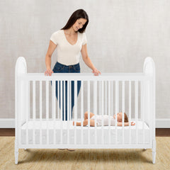 Delta Children Serta Perfect Slumber mattress close-up of waterproof cover for easy cleanup.