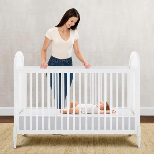 Delta Children Serta Perfect Start dual-sided mattress shows two sleeping surfaces for growth.