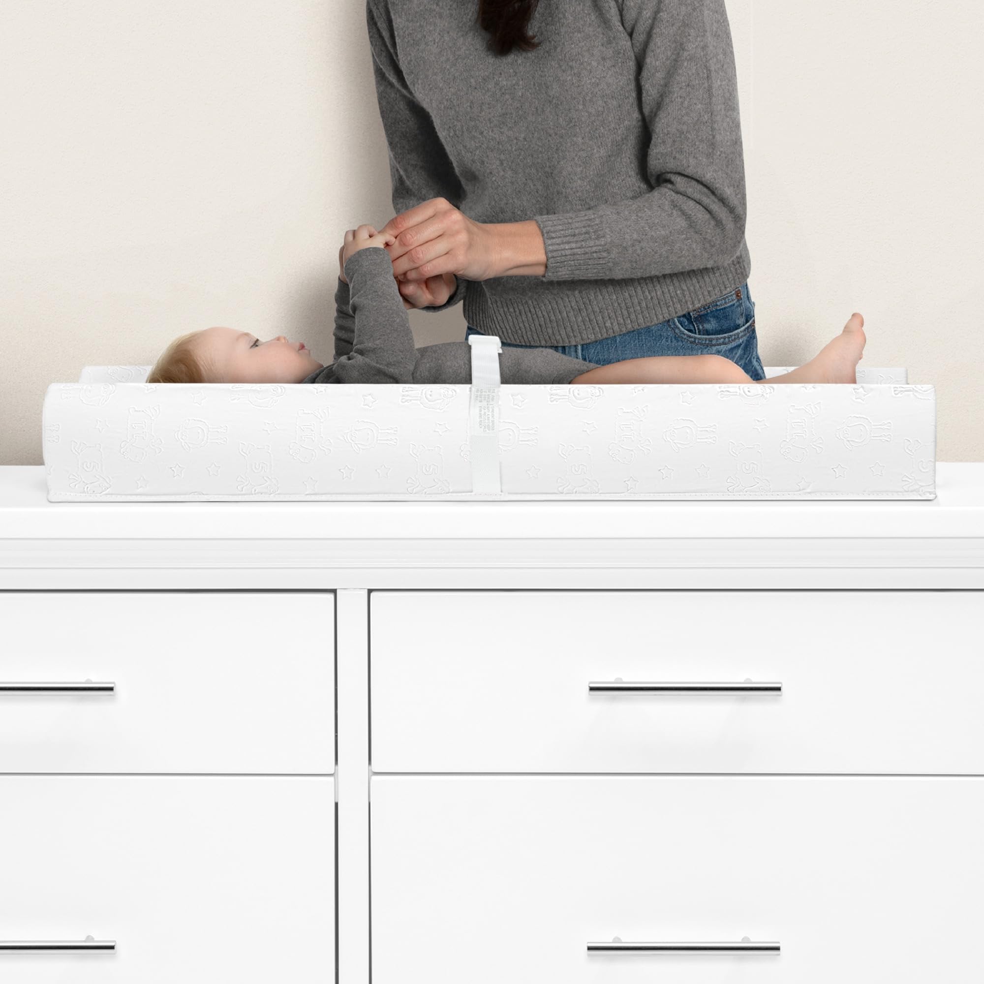 Delta Children Serta waterproof cover shown on changing pad for easy wipe-downs
