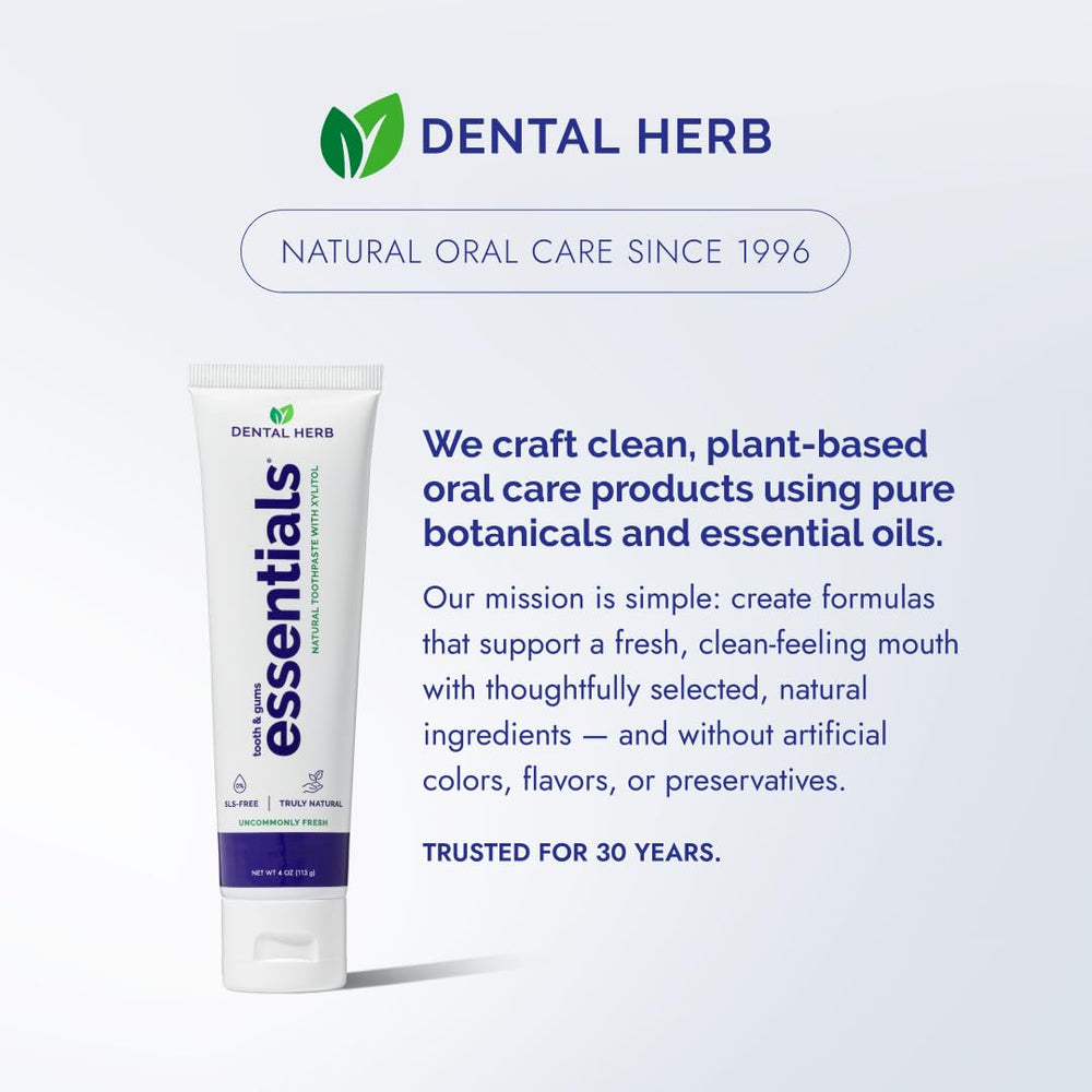 Eco-friendly packaging beside Dental Herb Company Essentials toothpaste.