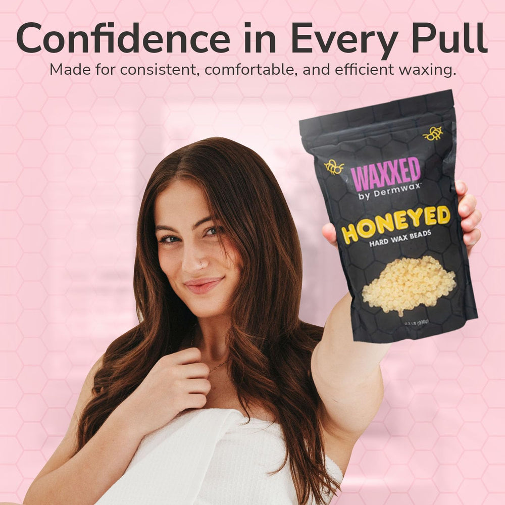 Dermwax WAXXED Honeyed hard wax beads clean removal in one piece.