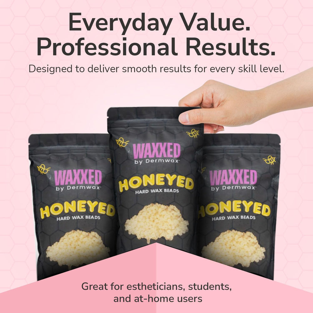 Dermwax WAXXED Honeyed hard wax beads in a salon scene.