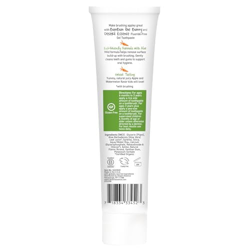 Desert Essence toothpaste dispensed on a kid's brush with gentle care.