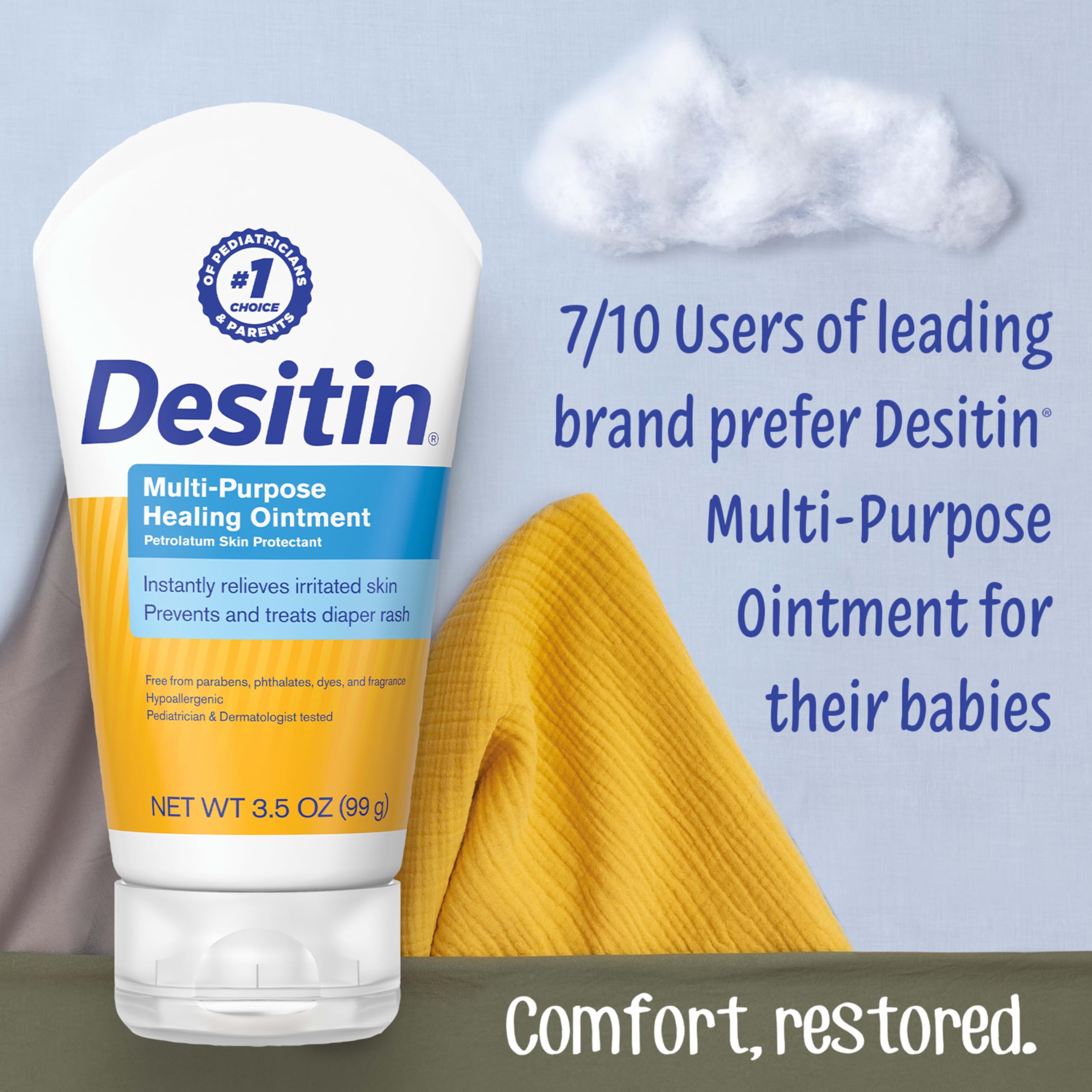 Close-up of Desitin ointment being applied to irritated diaper area for quick relief.