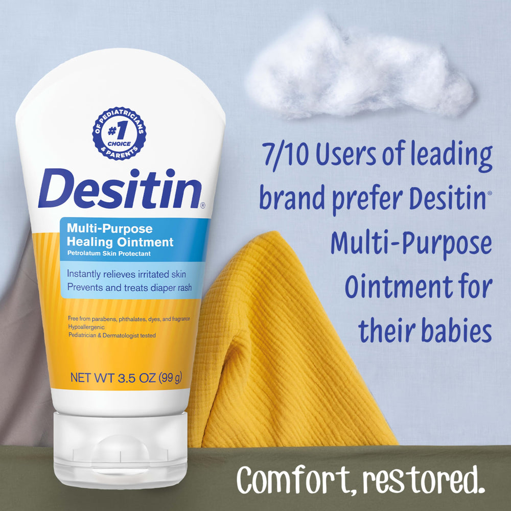 Close-up of Desitin ointment being applied to irritated diaper area for quick relief.