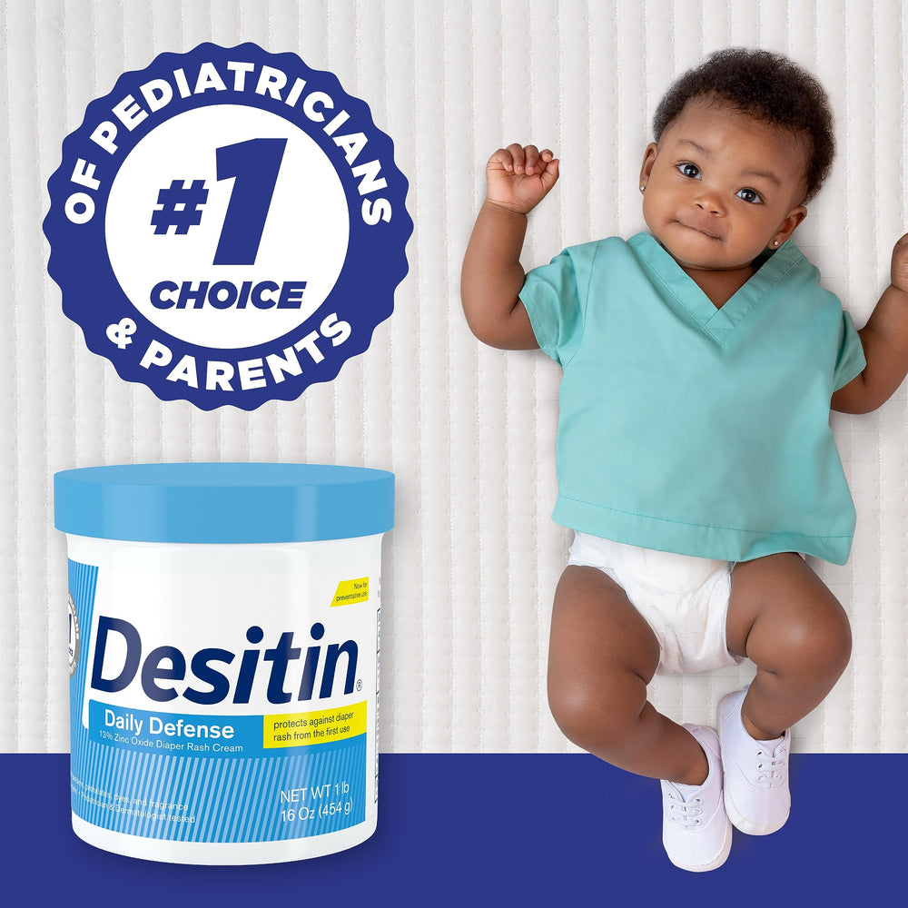 Baby diaper area protected by Desitin barrier during changing