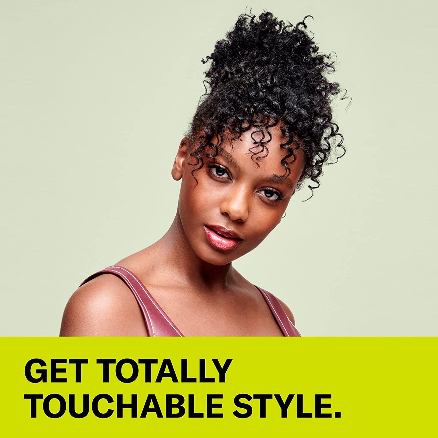 Frizz control and no-crunch finish demonstrated on styled curls