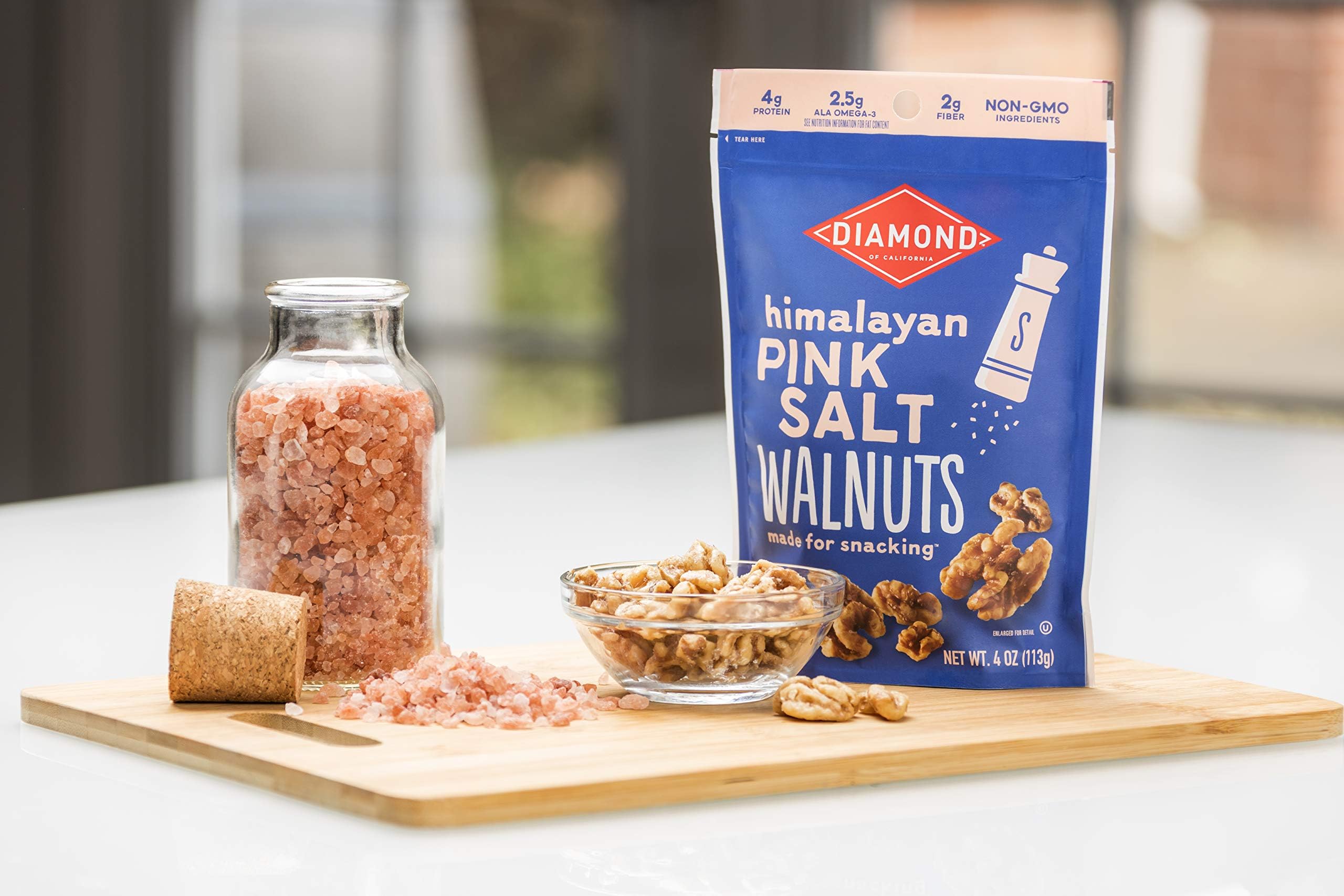 Closeup of Himalayan Pink Salt Walnut Snack nuts highlighting texture and color.