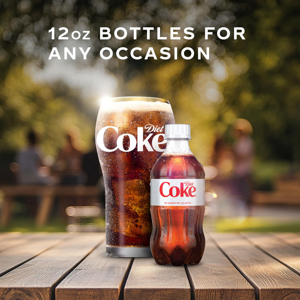 Pouring Diet Coke into a glass to reveal smooth fizz.