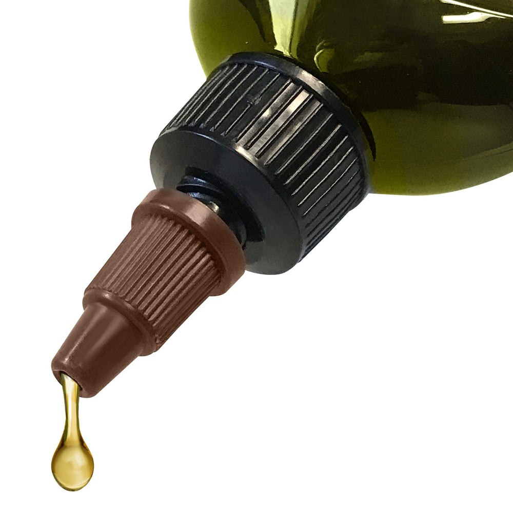 Difeel Biotin Hair Oil being applied to hair for volume and body.