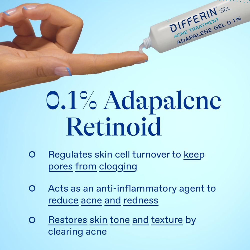 Differin acne gel tube in hand for on-the-go skincare.