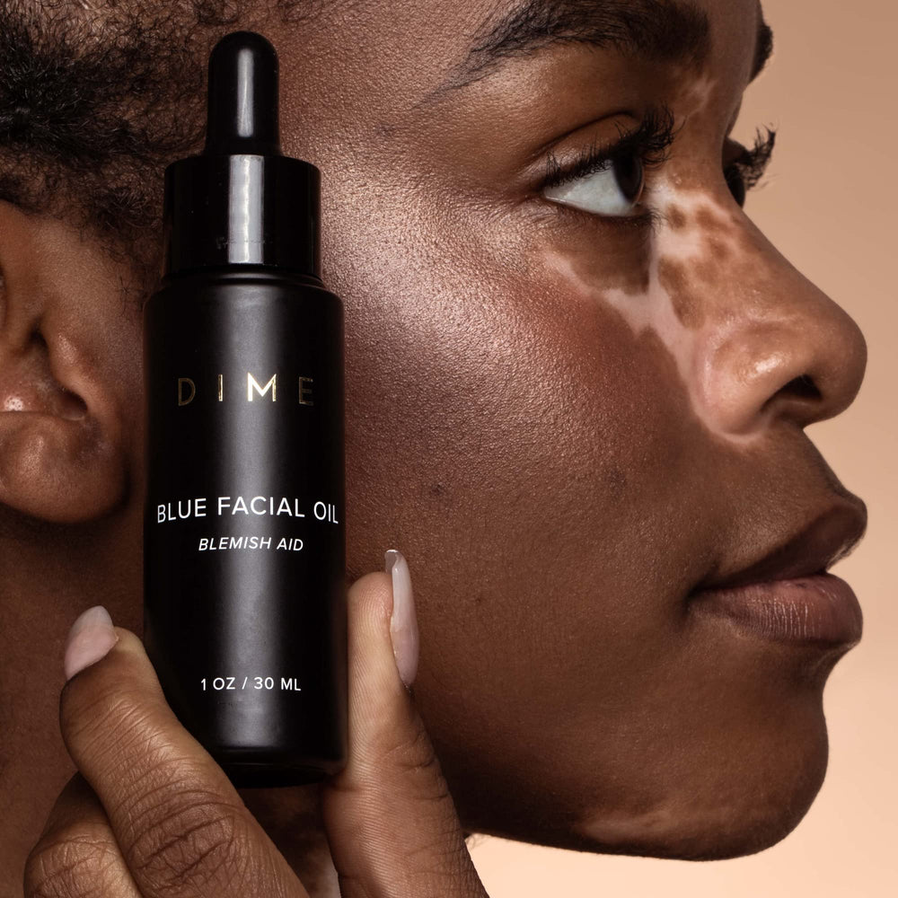 DIME Beauty Blue Facial Oil application spot shows targeted use for blemish-prone areas.