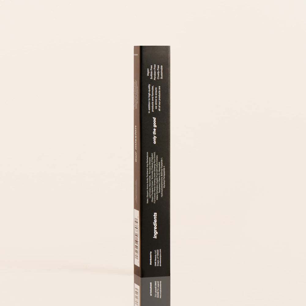 DIME Beauty Eyelash Boost Serum silky texture on skin suggests comfortable daily use.