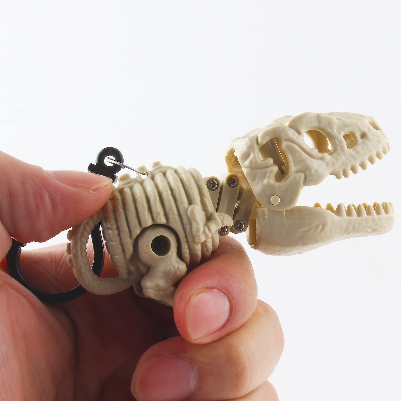 DINOBROS dino chompers spring jaw in action on a mini dinosaur