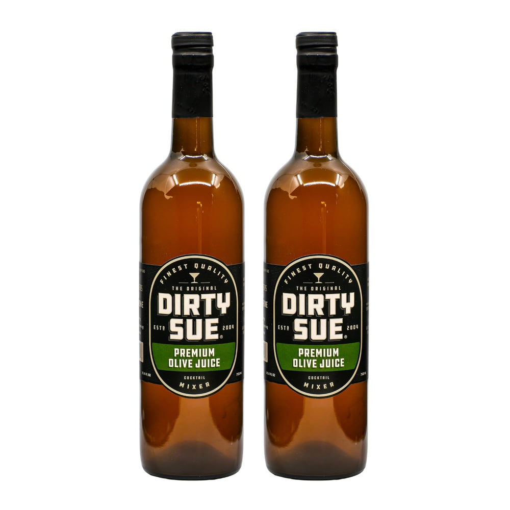 Dirty Sue olive juice bottle pouring for a premium dirty martini
