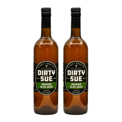 Dirty Sue olive juice bottle pouring for a premium dirty martini