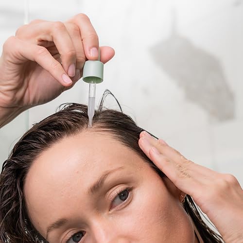 Divi Scalp Serum on clean background, suitable for daily use.