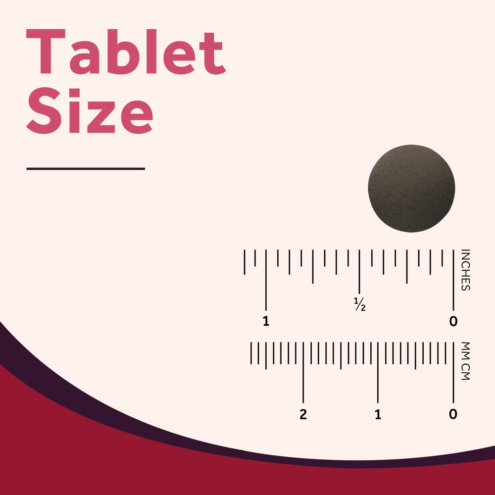 Iron tablet with glass of water for easy swallowing