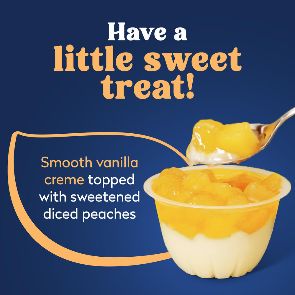 Dole fruit cup with lid open showing peaches and creme layers