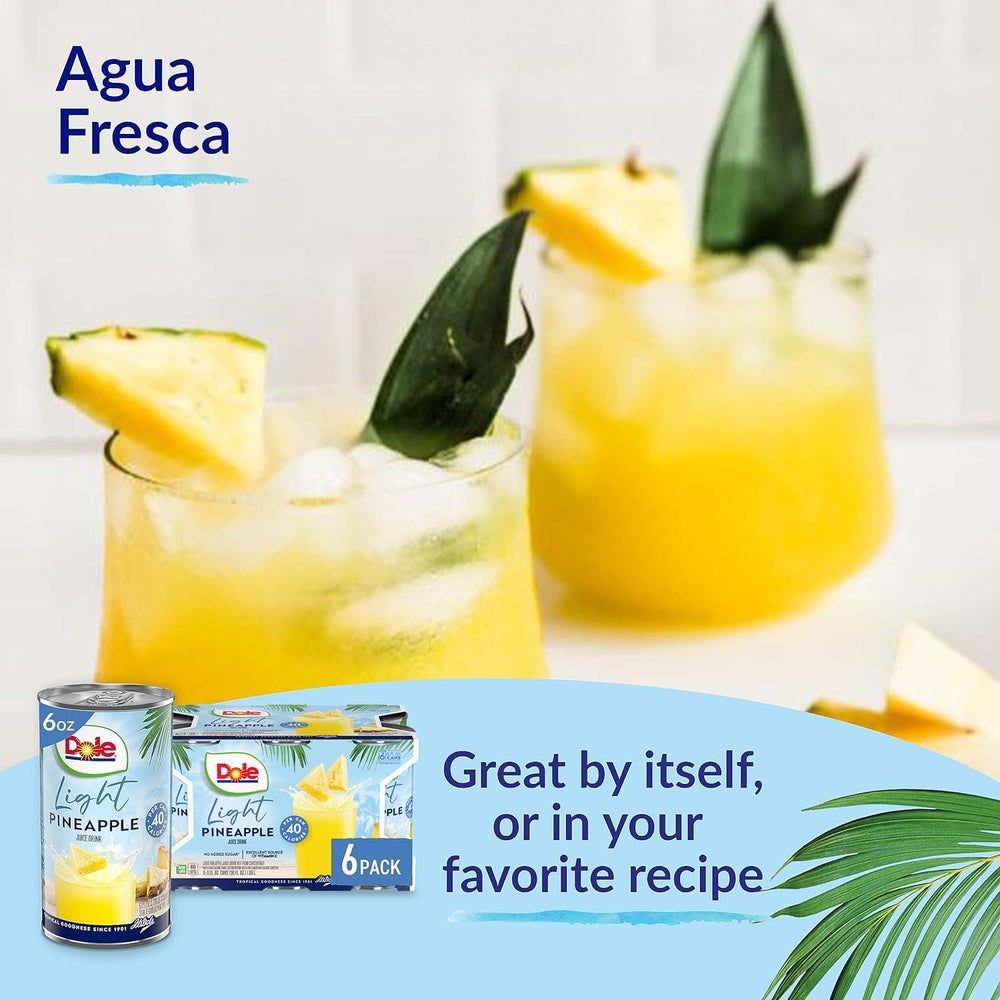 Dole Light Pineapple Juice in a glass with mint for a refreshing serving idea