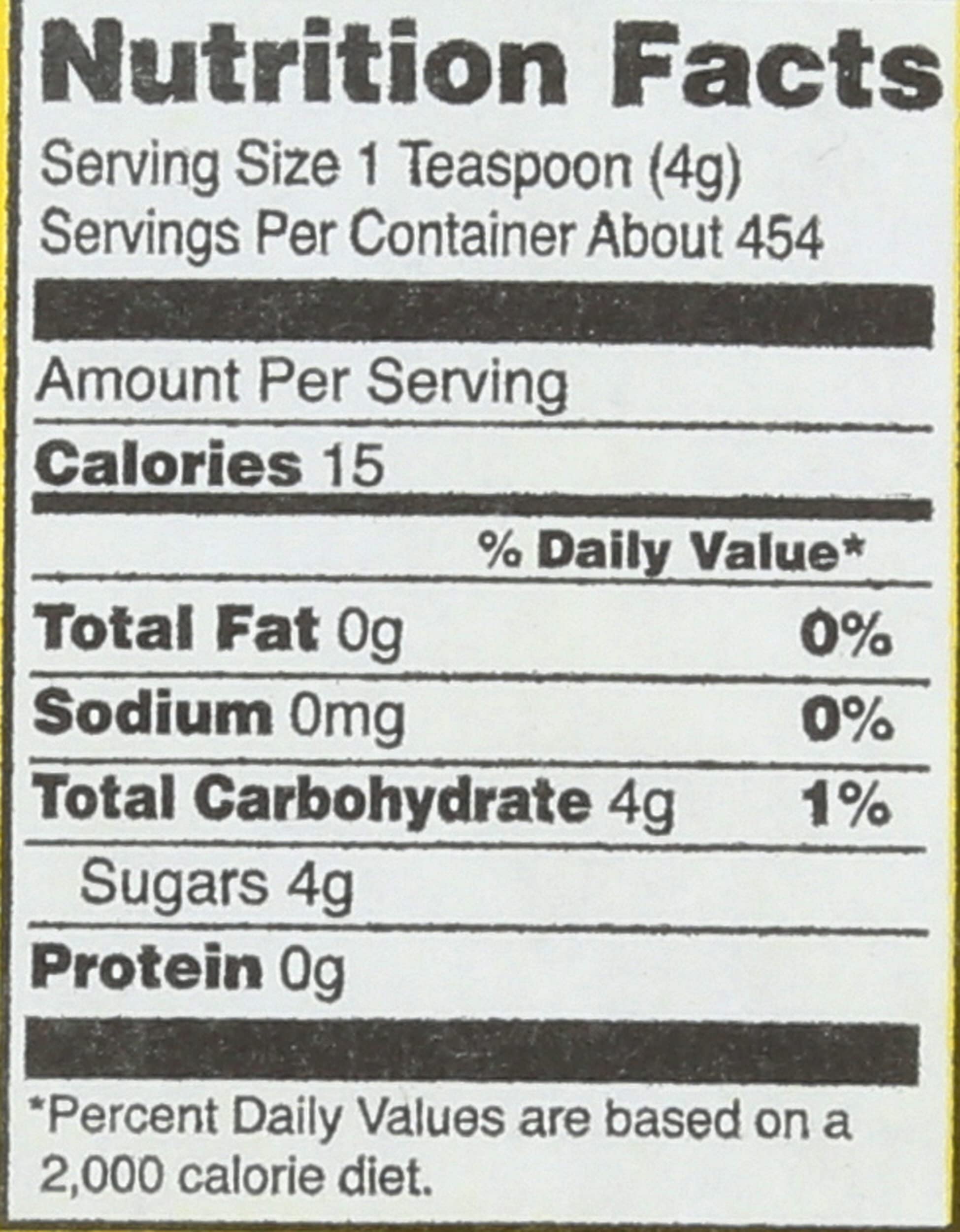 Close-up of Domino sugar granules highlighting fine texture for smooth dissolving.