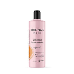 Donna's Recipe leave-in conditioner bottle for daily moisture and easy styling.