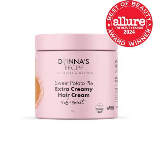Donna's Recipe cream being applied to define curls without heaviness