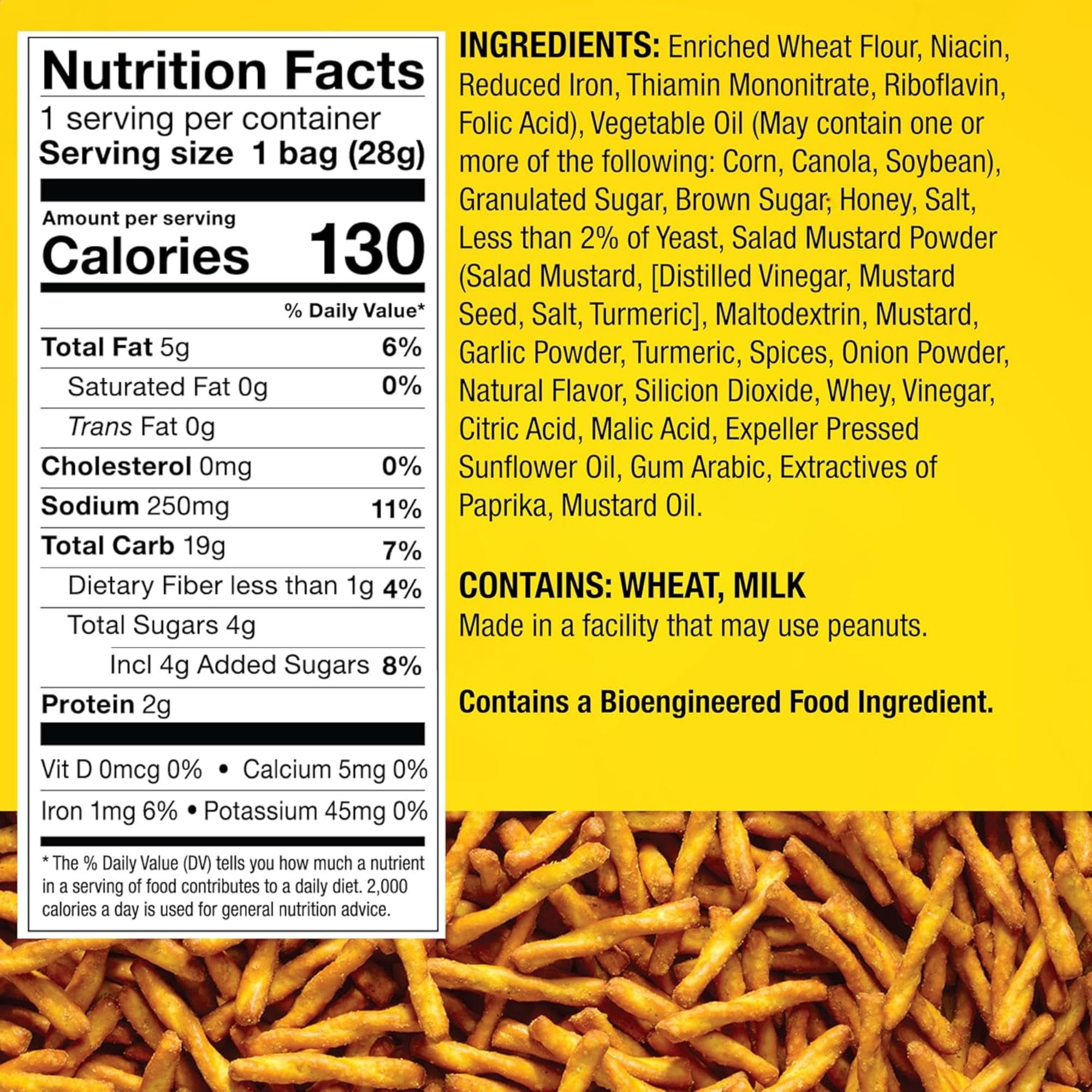 Close-up of honey mustard seasoning dust on Dot's pretzel twists, highlighting savory flavor appeal.