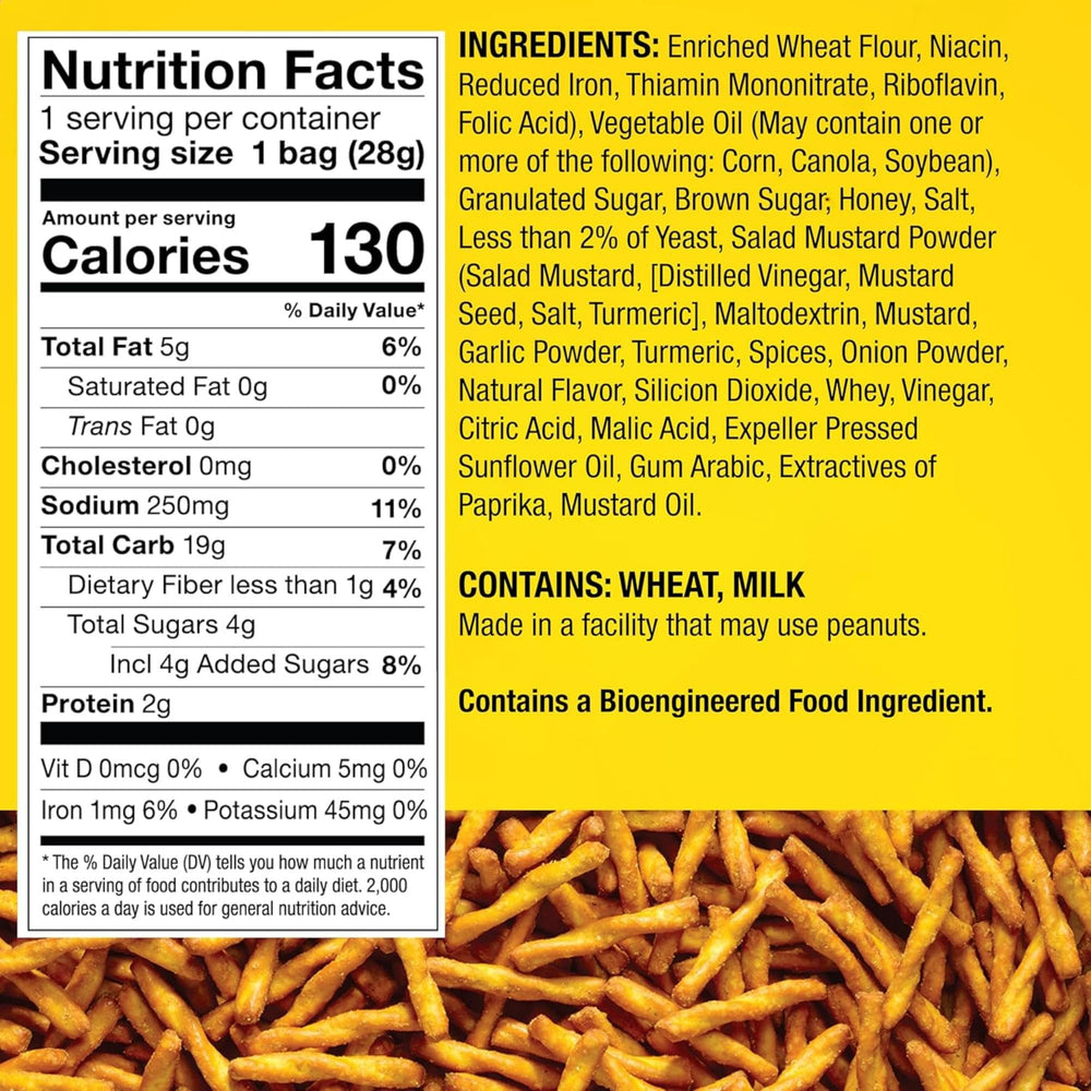 Close-up of honey mustard seasoning dust on Dot's pretzel twists, highlighting savory flavor appeal.