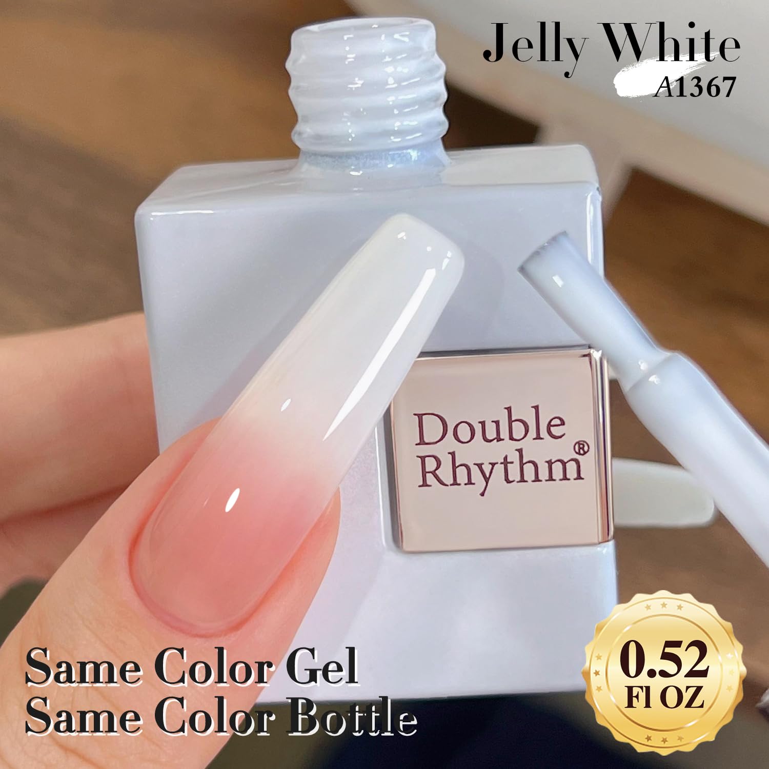 Double Rhythm base coat application for optimal nail adhesion.