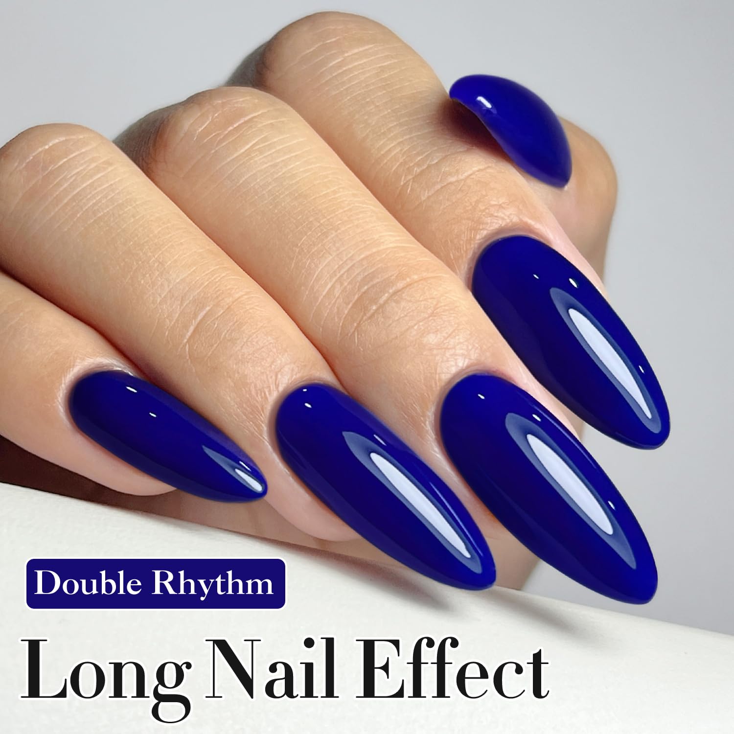 Double Rhythm high-gloss navy gel polish provides vibrant, salon-like shine.