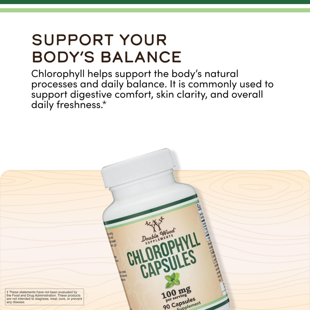 Double Wood Chlorophyll capsules with glass of water suggests easy daily intake