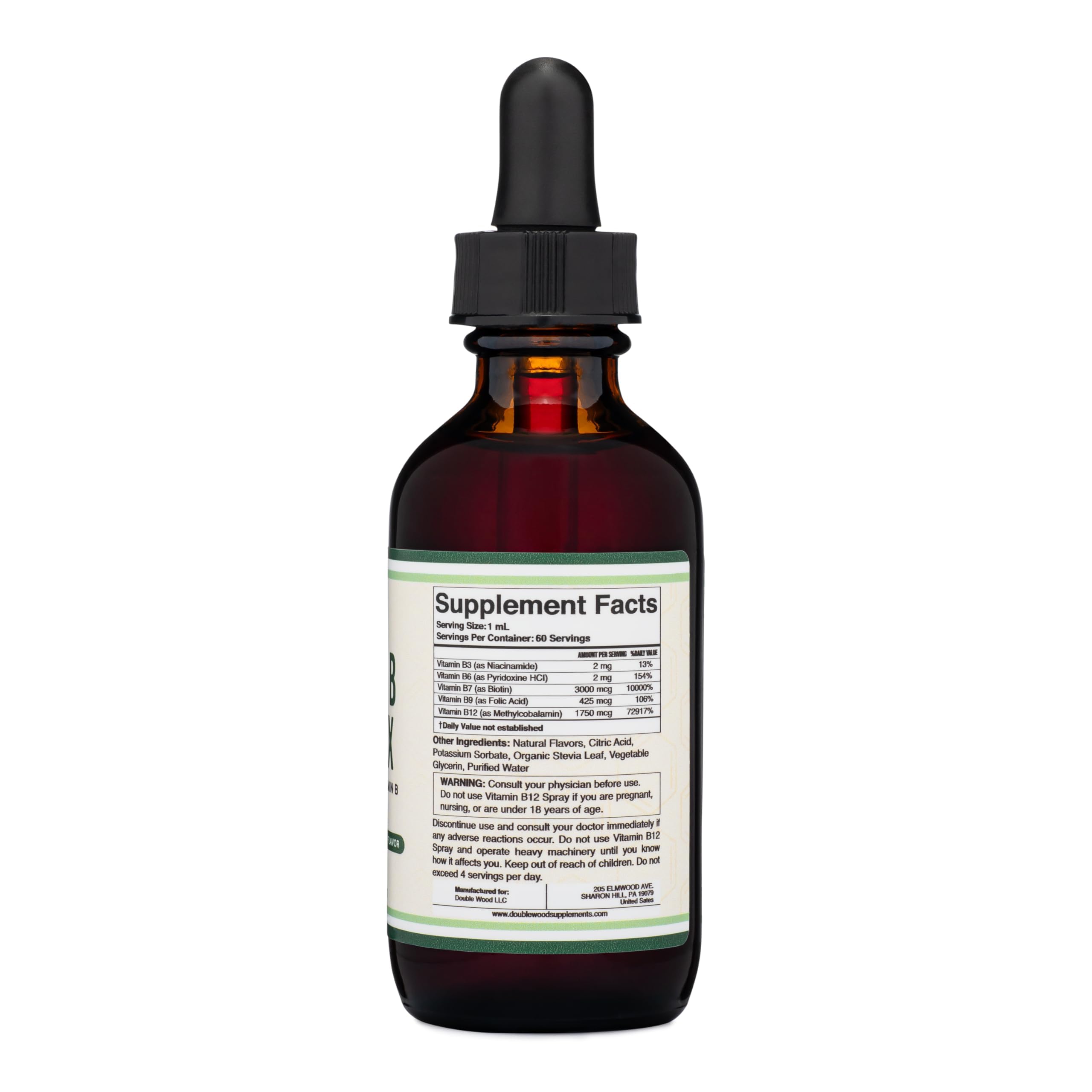 Double Wood liquid B complex drops being poured for easy daily use.
